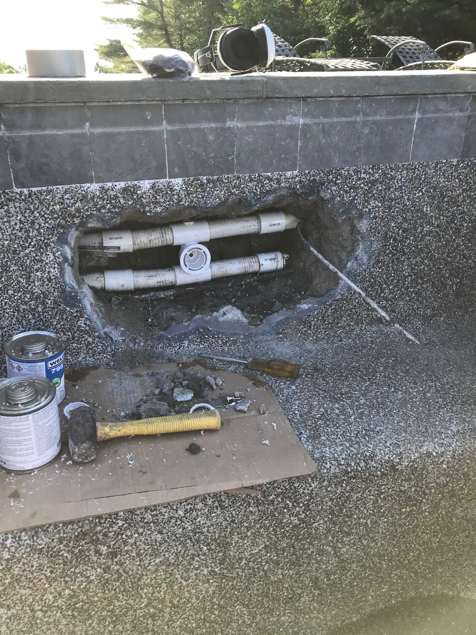 Exposed spa plumbing with old PVC pipes and new fittings ready to install — spa leak repair