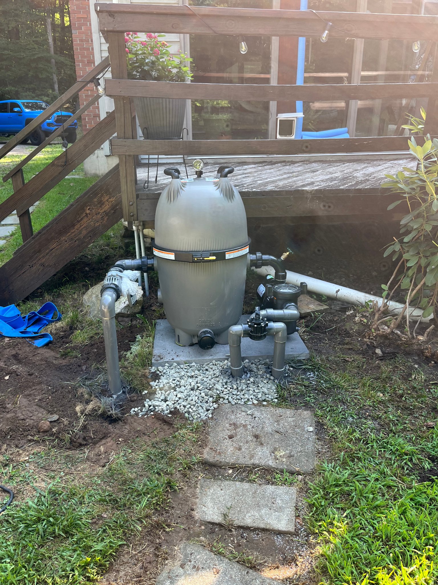Brand new DE filter installed on concrete pad — equipment upgrade complete